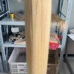 Raw 613 platinum blonde 50 inch full lace wig on mannequin