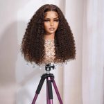 A voluminous kinky curly lace wig in natural brown, available in 5x5 closure and 13x4 lace front, 100% virgin human hair