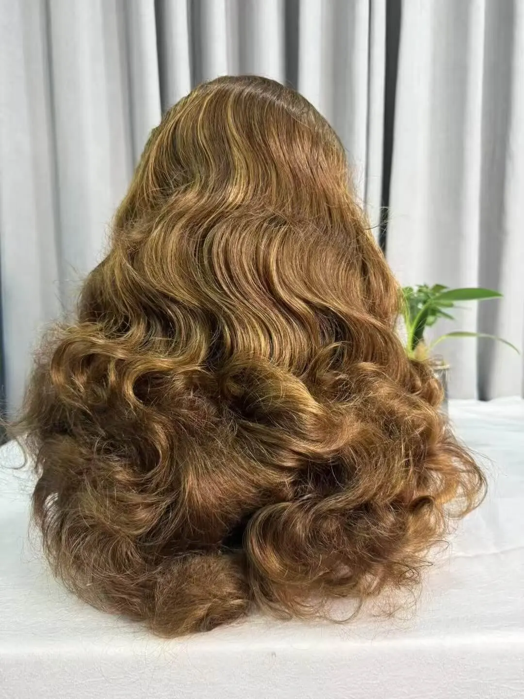 oft and voluminous Bouncy Wave 5x5 HD Lace Wig made with 100% Virgin Human Hair. Glueless, natural-looking, and perfect for everyday wear or special occasions.